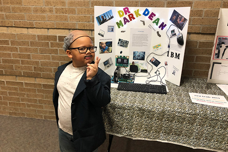 Malachi Samuel of Houston, Texas, delivered his first-grade living history presentation as Interim Dean and Computing Pioneer Mark Dean.