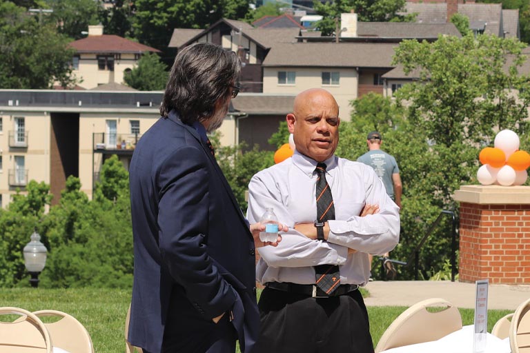 Mark Dean chats with EECS Department Head Greg Peterson during the Spring 2019 Senior Celebration.