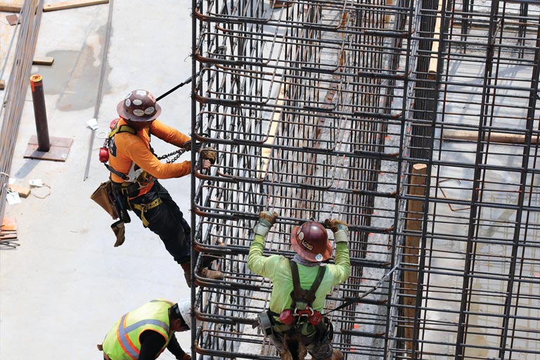 Workers Installing Rebar on New Engineering Complex
