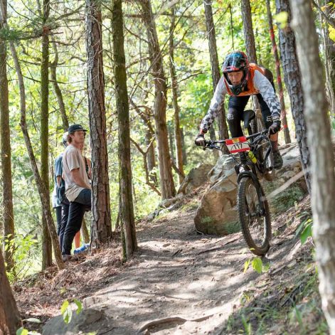 Avah Cherry riding her mountain bike