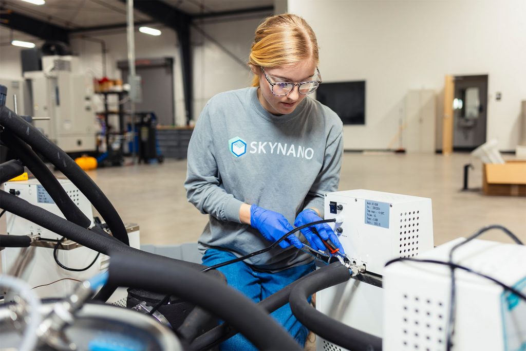 Lucy Moore working at the Center for Materials Processing