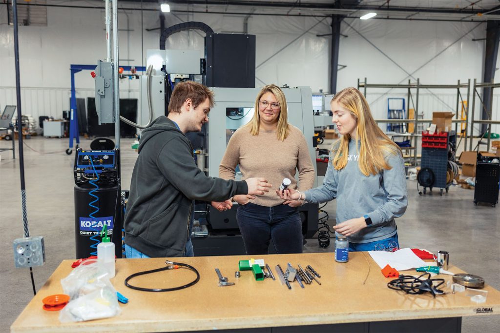 Claudia Rawn and students at the Spark Innovations Center.