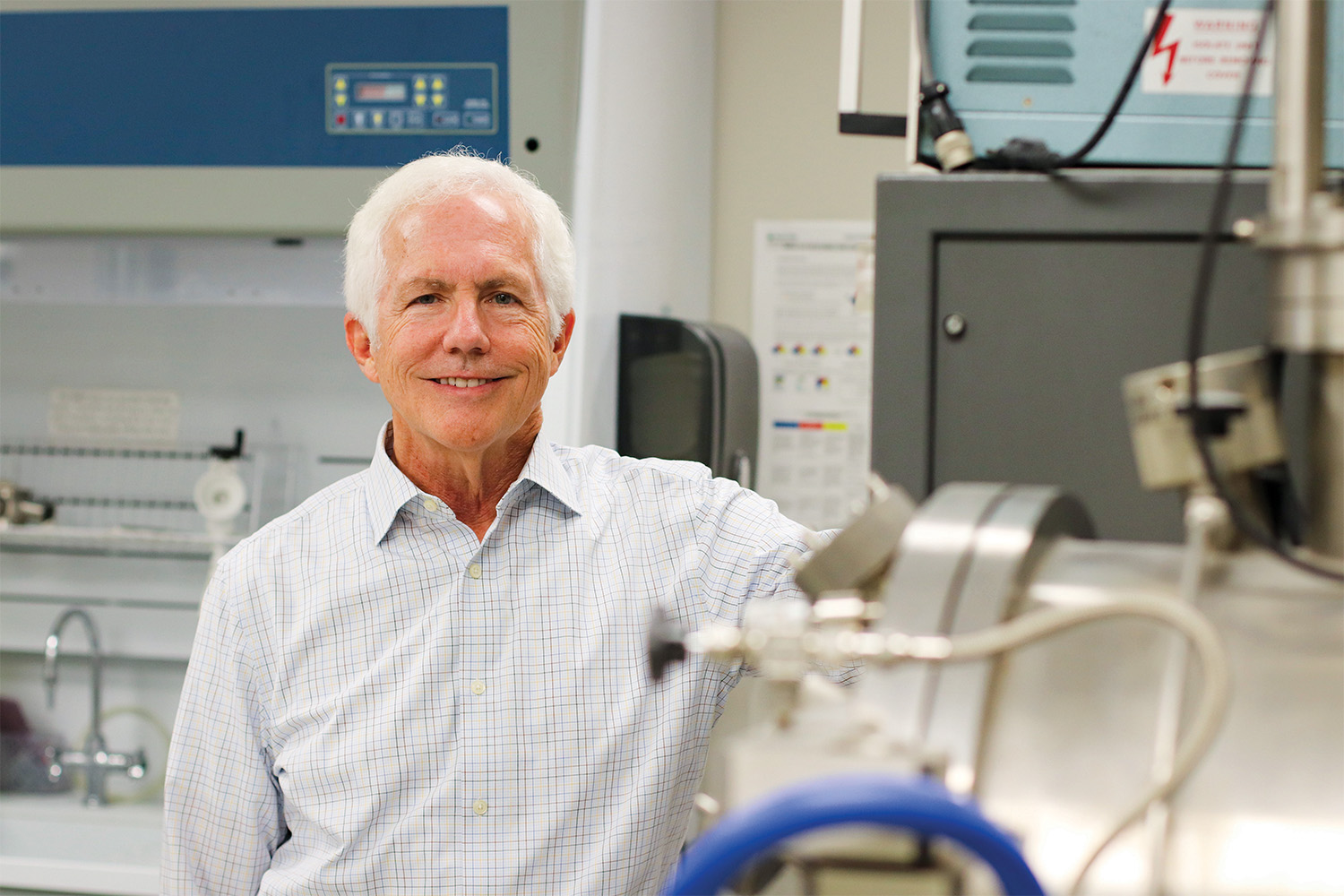 Chuck Melcher standing in a lab