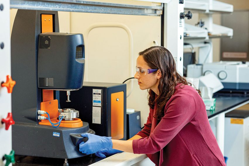 Ria Corder works in a lab at UT-ORII