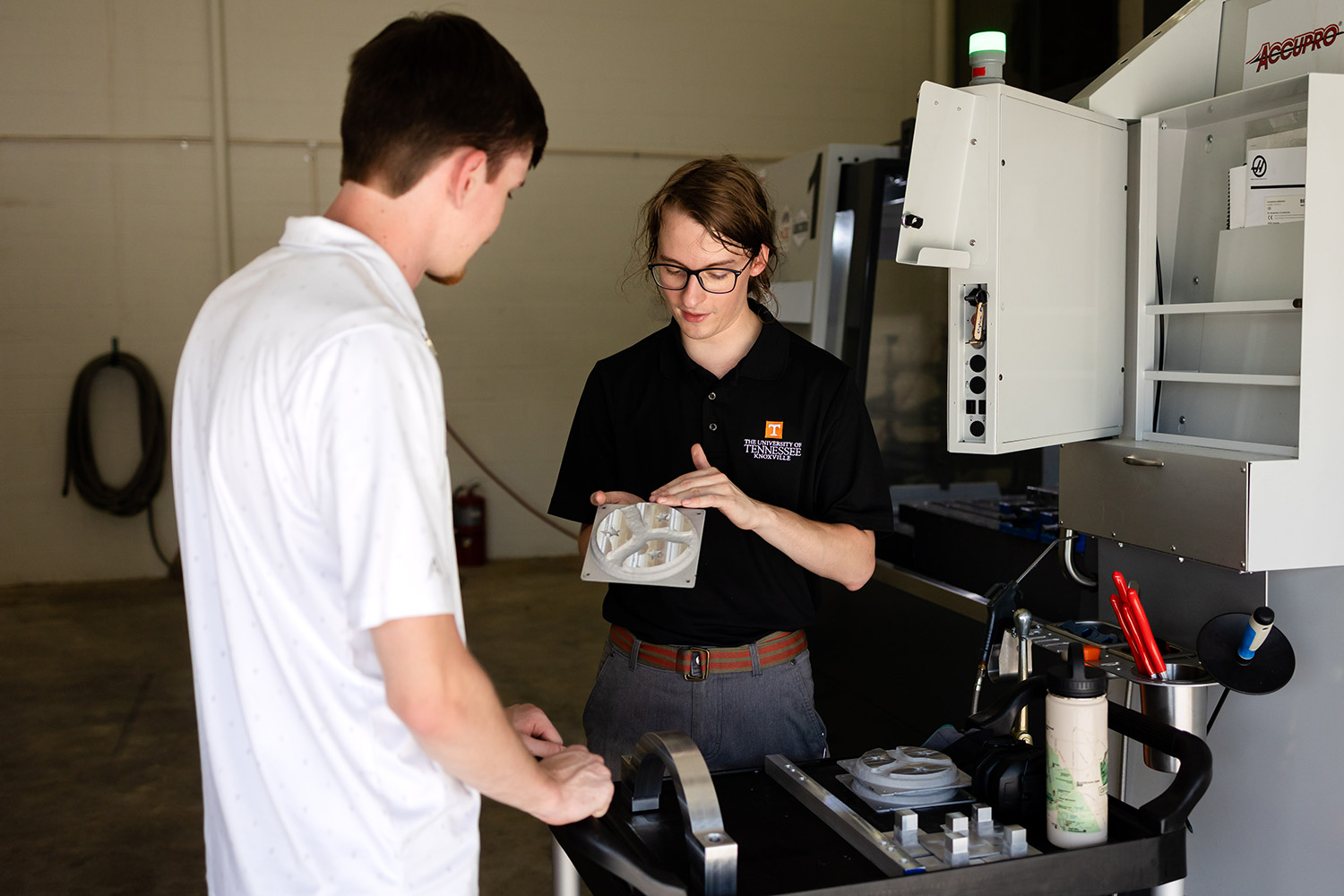 Engineering student showing engineering design tools