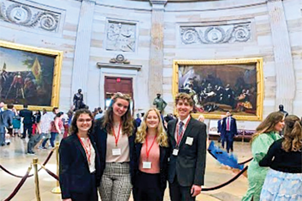 MSE students standing inside the Capitol building under the dome