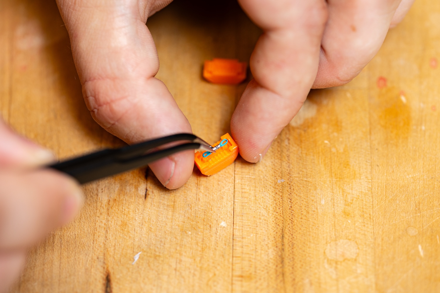 David Dabkowski working on a piece of a prosthetic