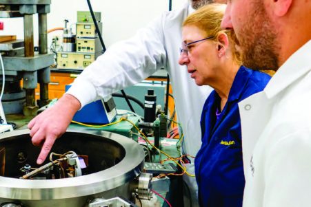 From left to right: R. Lee Leonard, Jackie Johnson, and Chad Bond work with their patented technology at UTSI