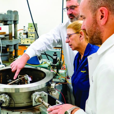 From left to right: R. Lee Leonard, Jackie Johnson, and Chad Bond work with their patented technology at UTSI