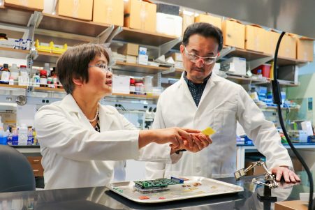 Jayne Wu and Shigetoshi Eda in a lab