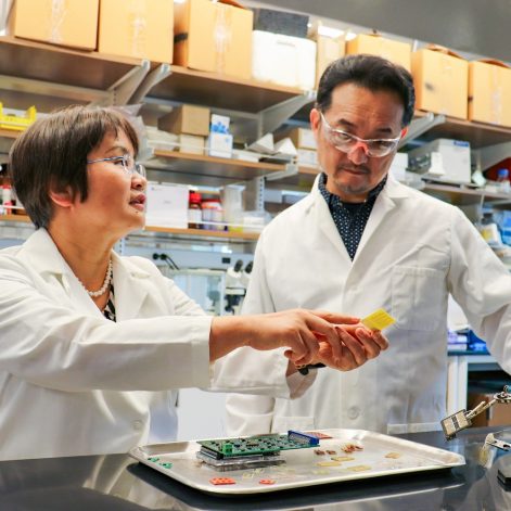 Jayne Wu and Shigetoshi Eda in a lab