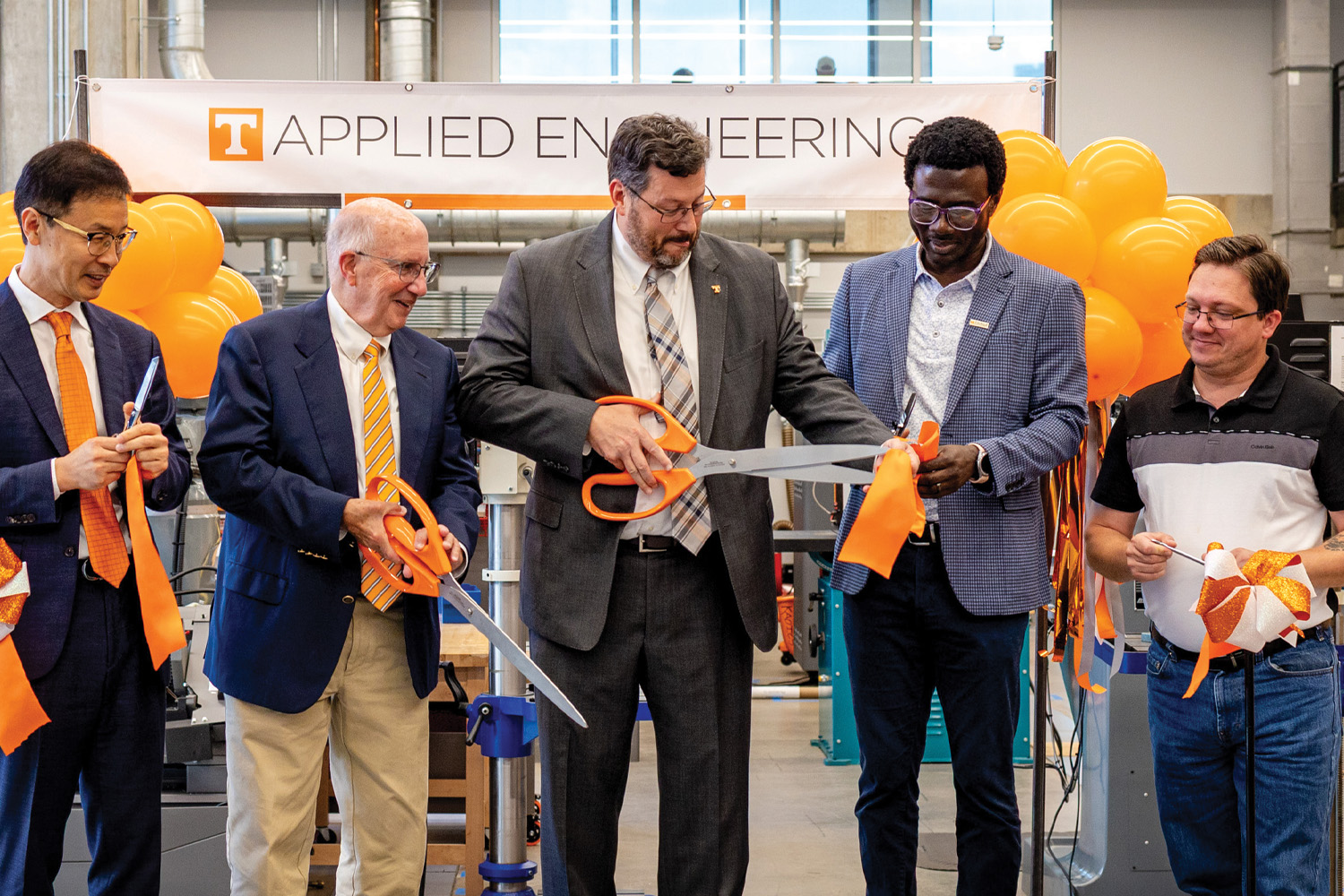 Ribbon being cut during ceremony
