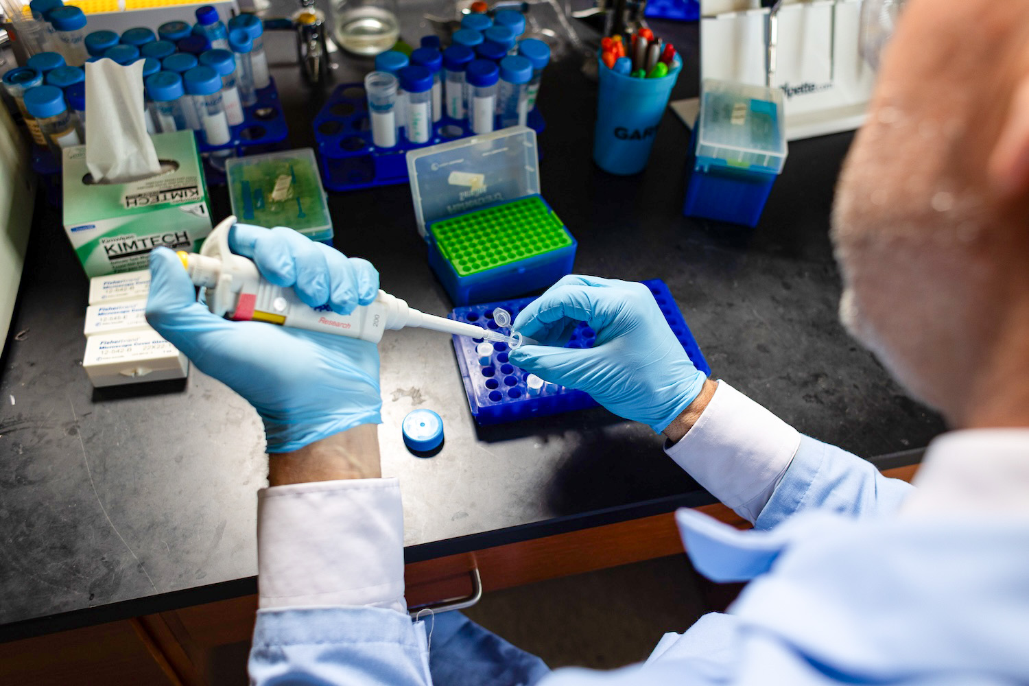 Paul Dalhaimer doing experiments in his lab