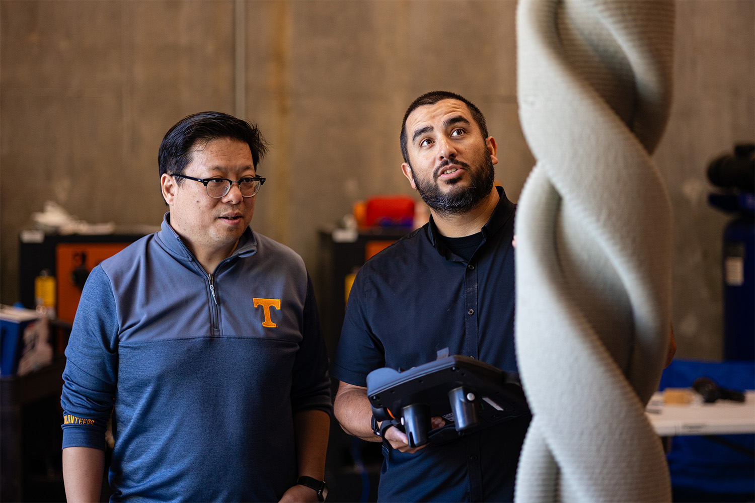 Prado and Zhou check on extruder