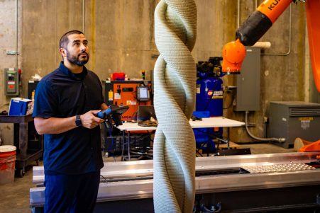 Marshall Prado demonstrates using the 3D Concrete Extruder