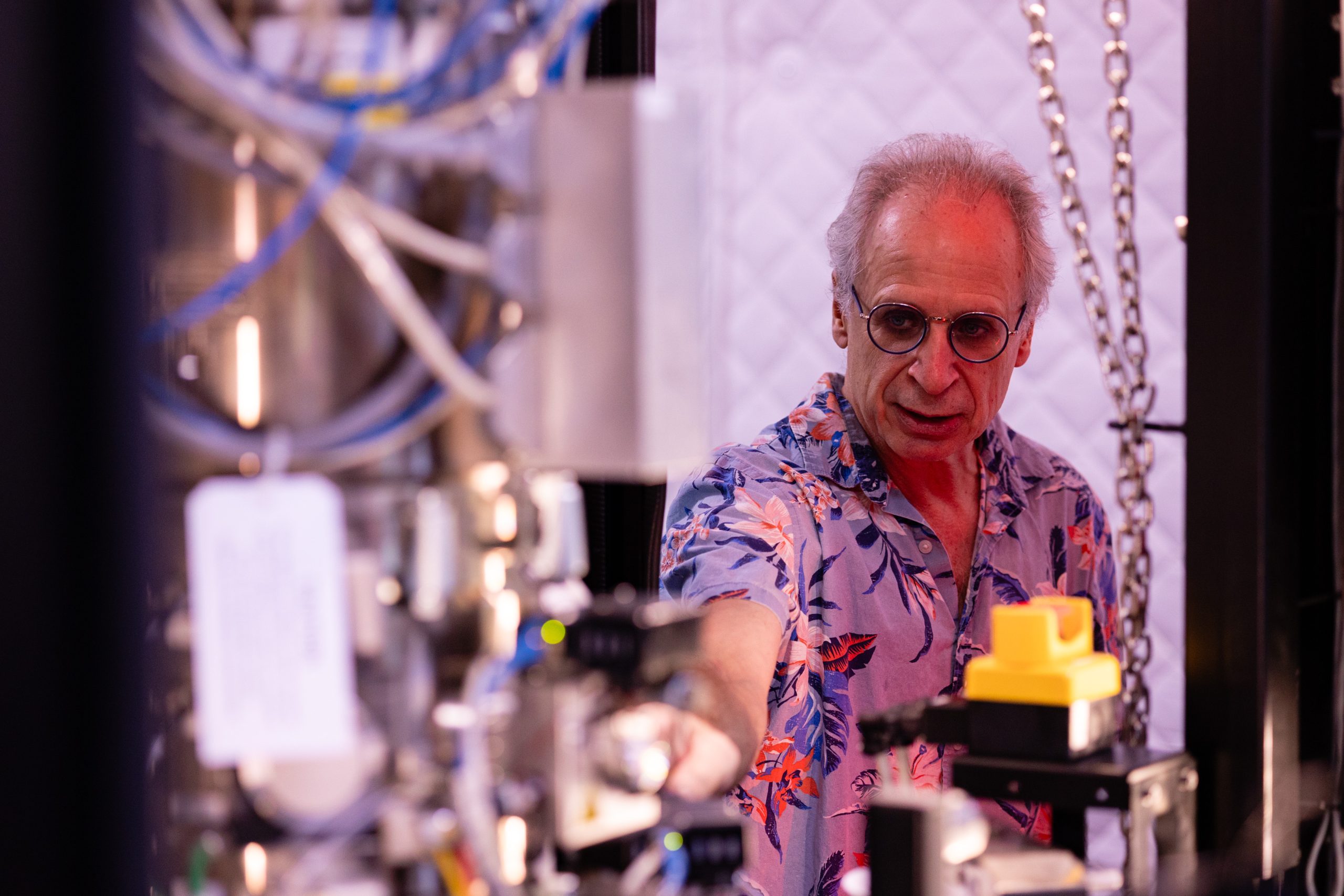 Professor Gerd Duscher working with equipment in a lab