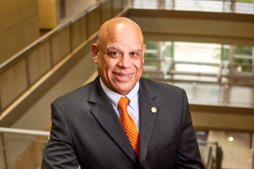 Mark Dean stands in the Min Kao Engineering Building