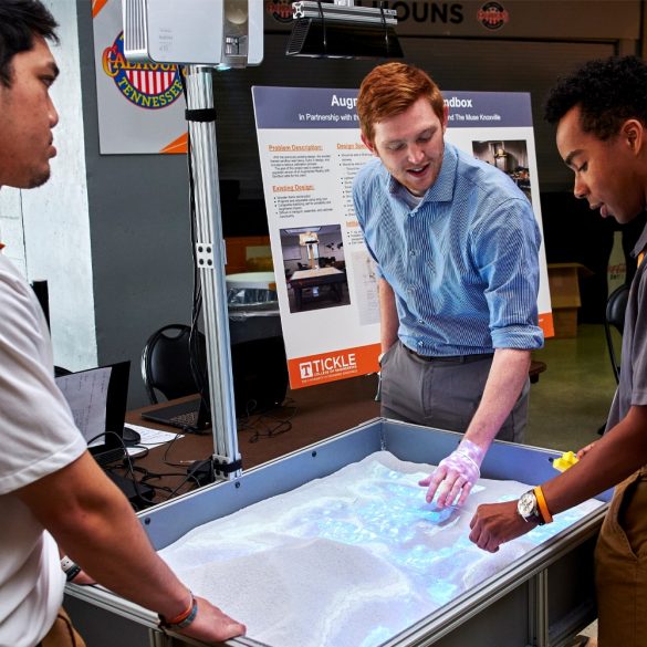 Students Demonstrate the Use of their Project to Another Student