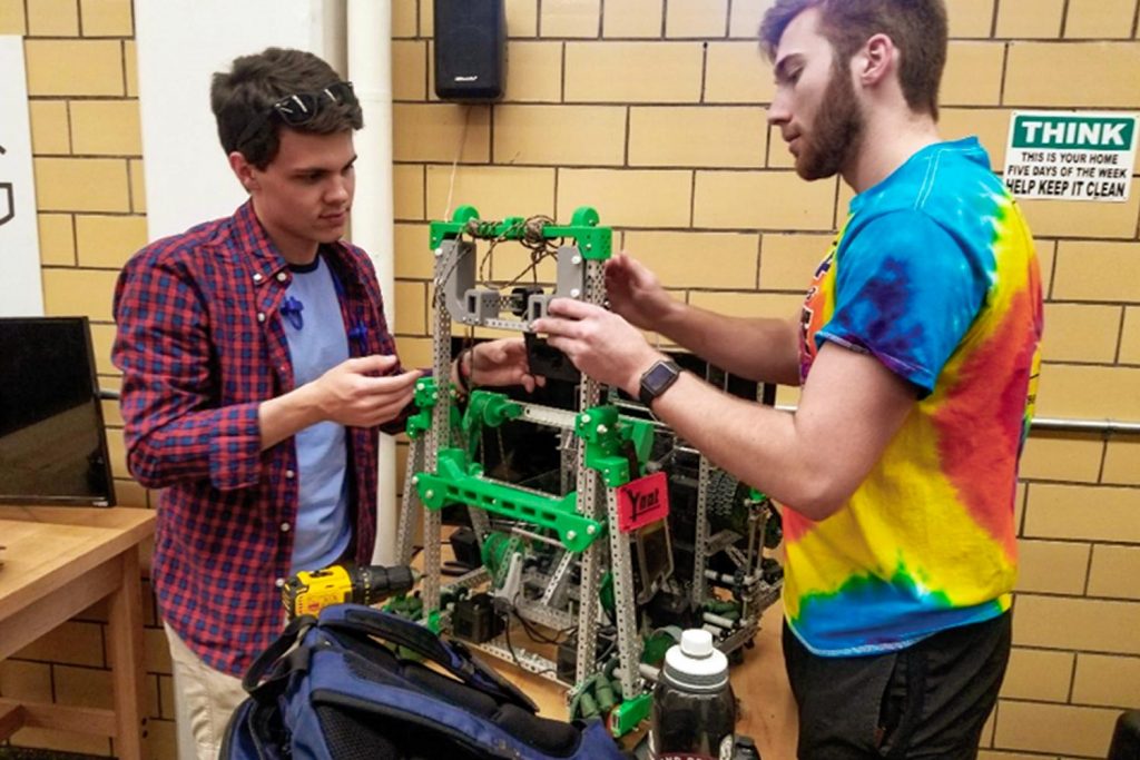 Team Works on Robot for YNot competition