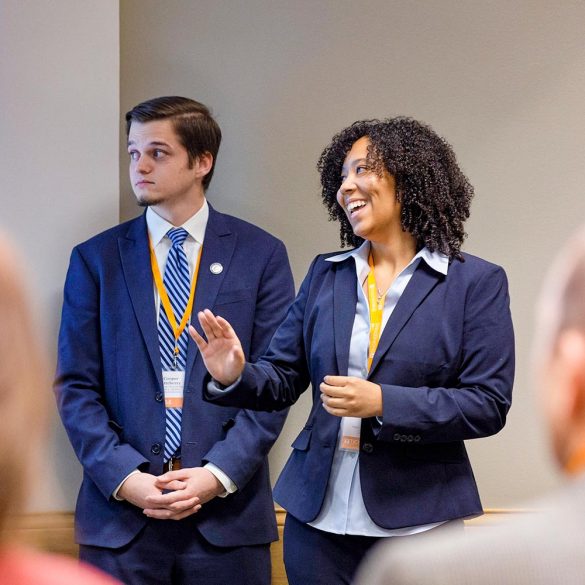 Two students present at the System Level Design Review