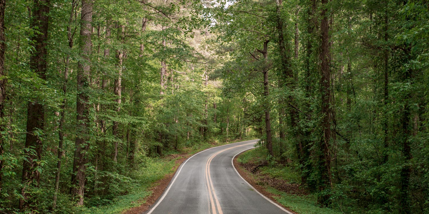 Empty Street through a Mountain