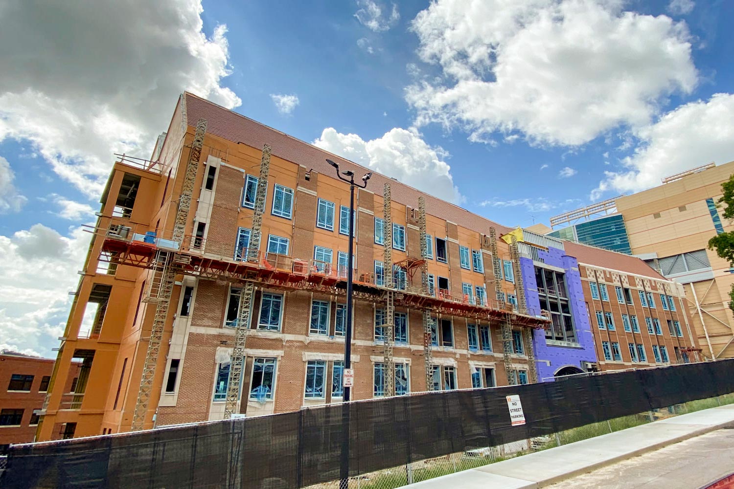 The brick work on the north side of the building being worked on in late August