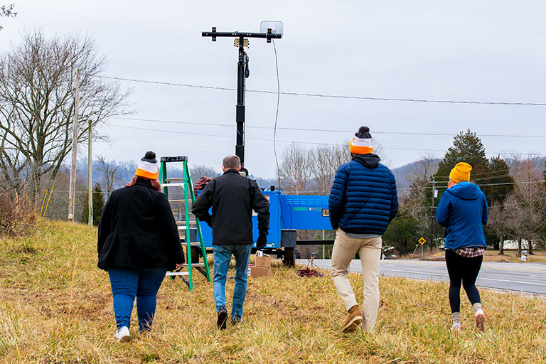 Students Walking Toward Signal Trailer