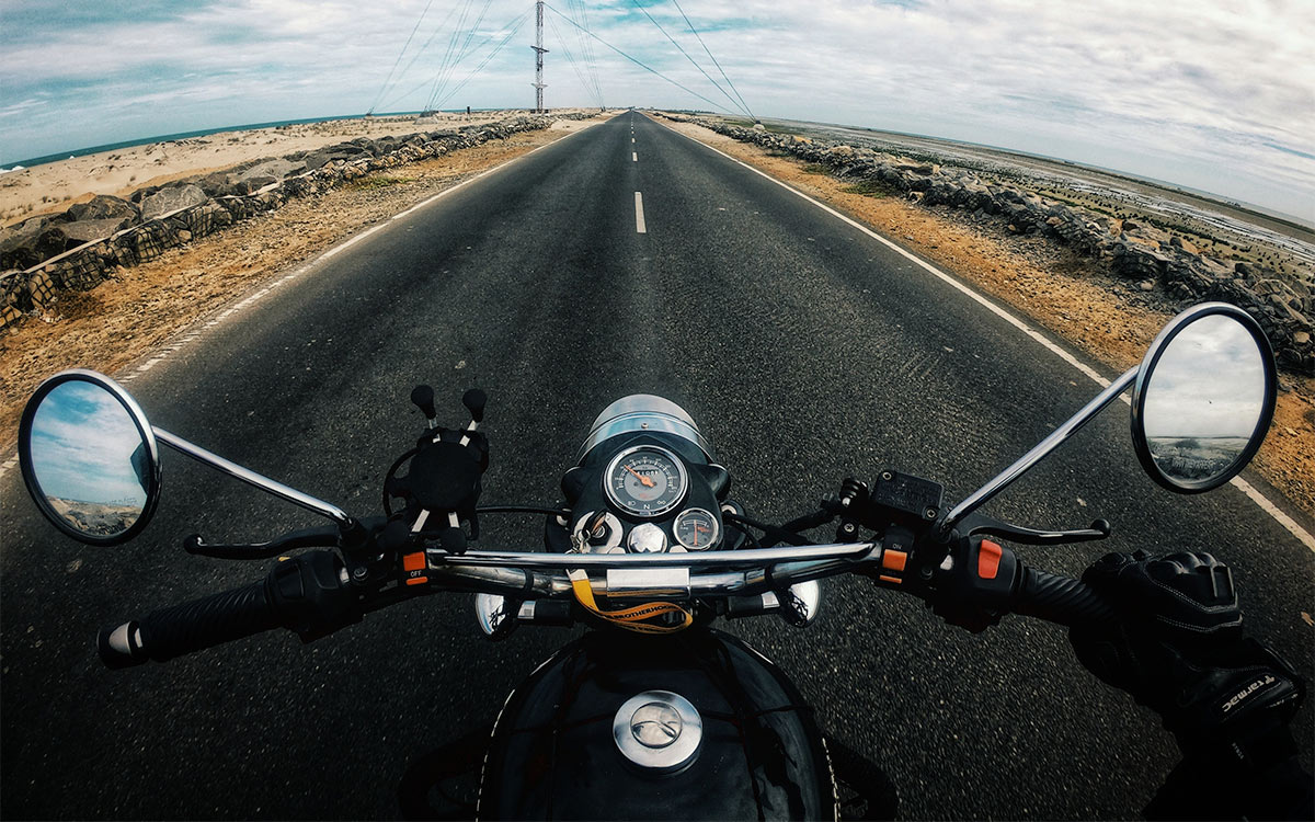 Motorcycle going down highway