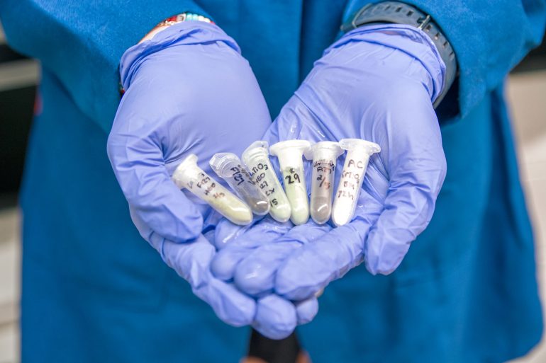 MSE Student Holding Samples