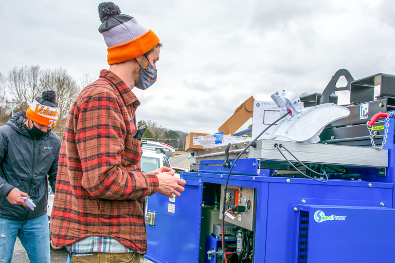 Students working on signal trailer