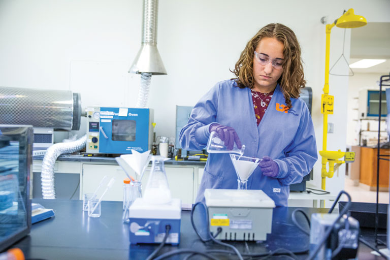 Student working in science lab at UTSI