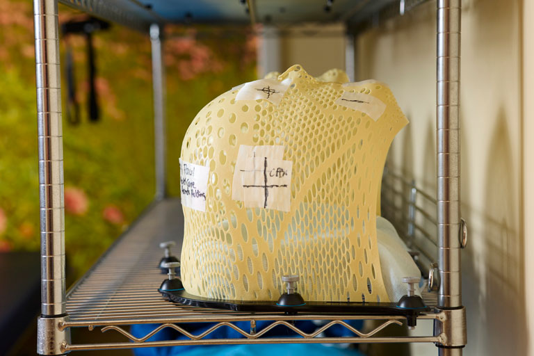 A closeup of one of the form-fitting head guards that are used to keep patients perfectly still during treatment