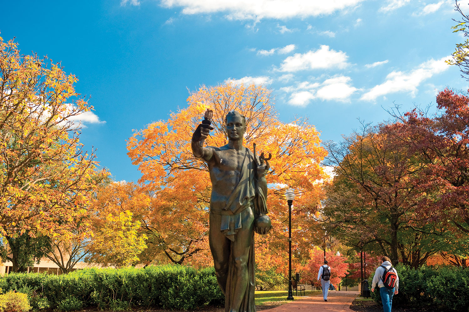 Torchbearer on a fall sunny day