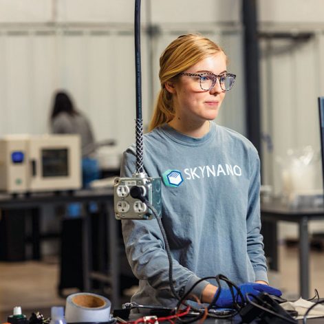 Lucy Moore working at her desk at the Center for Materials Processing.