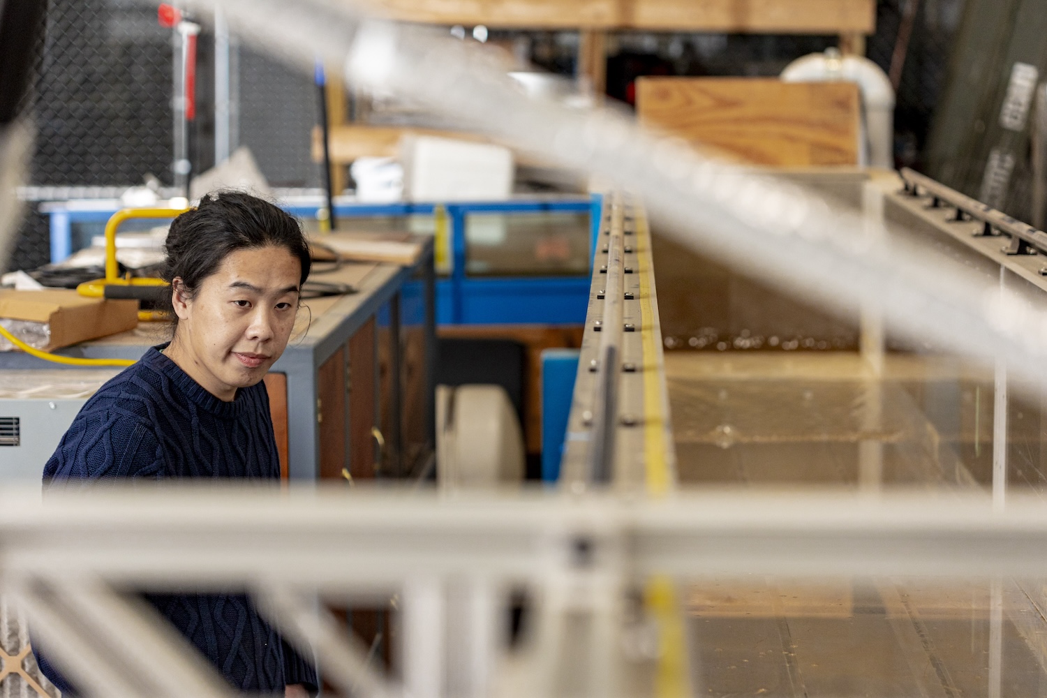 Haochen Li in his lab working with the flume