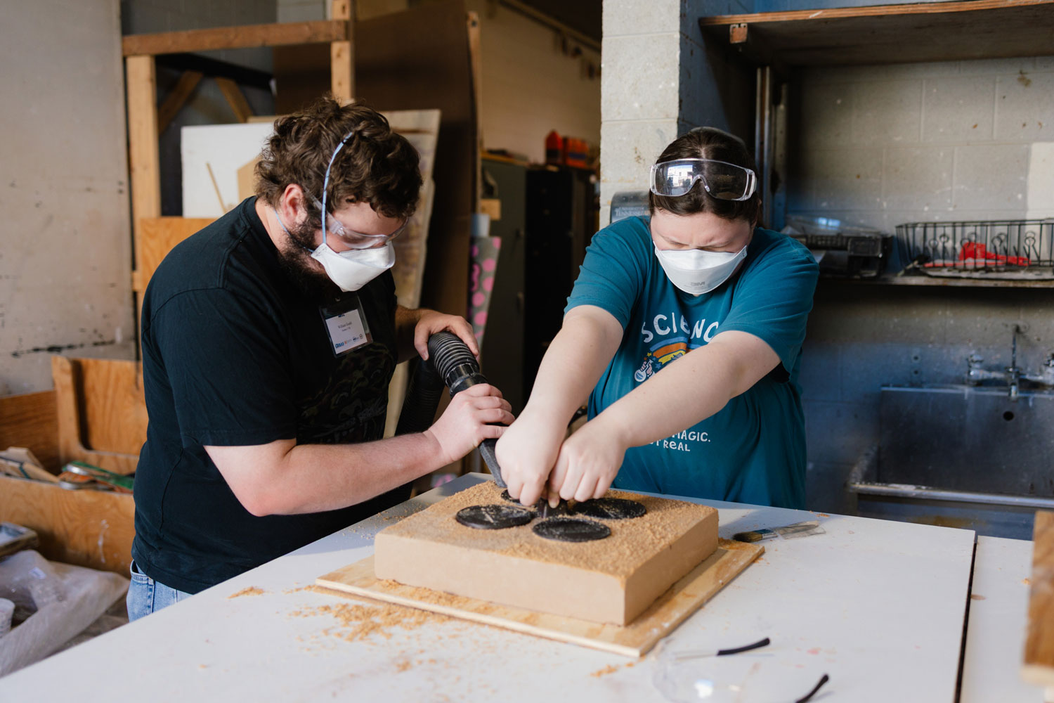 Students showing engineering tools